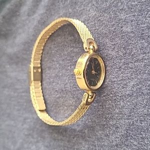 Timex women's watch; gold, vintage 377 BA CELL